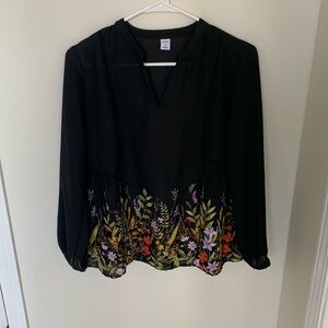 Black long sleeve blouse with colored floral on the bottom